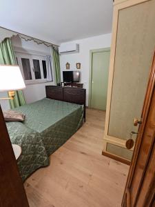 Postel nebo postele na pokoji v ubytování B&B Casa Tessieri