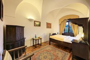 Voodi või voodid majutusasutuse Hotel Ruze toas