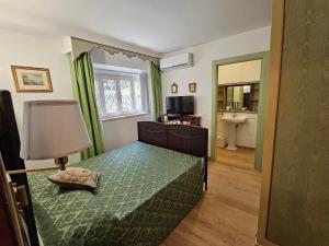 Postel nebo postele na pokoji v ubytování B&B Casa Tessieri