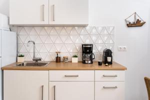 Kuchyň nebo kuchyňský kout v ubytování Naxos Joya Apartment + 6 fotografií