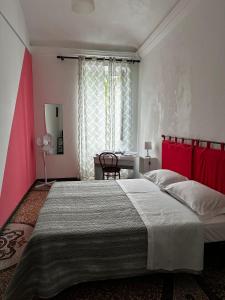 Postel nebo postele na pokoji v ubytování B&B Madama Teresa