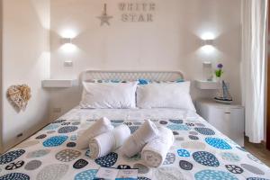 Voodi või voodid majutusasutuse White Star rooms holiday accomodation self check-in toas