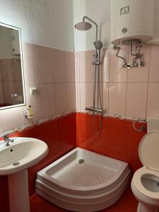 Koupelna v ubytování SIRENA HOTEL