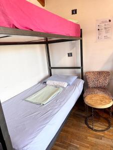 Letto o letti in una camera di Divina Hostel