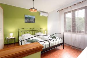 Postel nebo postele na pokoji v ubytování Studio Apartment