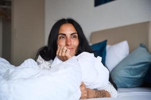 Postel nebo postele na pokoji v ubytování Aabach Hotel