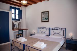 Postel nebo postele na pokoji v ubytování Villa Cyclades Naxos