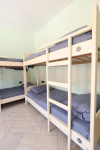 Postel nebo postele na pokoji v ubytování Hostel Osho