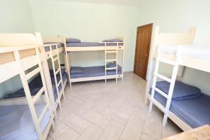 Postel nebo postele na pokoji v ubytování Hostel Osho