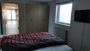 Postel nebo postele na pokoji v ubytování Vandrehuset 2 og 3