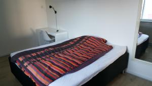 Postel nebo postele na pokoji v ubytování Vandrehuset 2 og 3