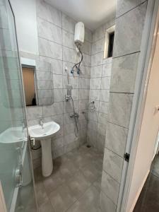 Koupelna v ubytování Mayama Residences
