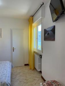 TV a/nebo společenská místnost v ubytování Hotel Casa Popi