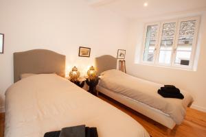 Apt luxueux avec une vue splendide客房内的一张或多张床位