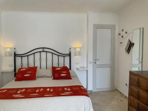 Voodi või voodid majutusasutuse Piccolo Hotel Luisa toas