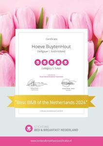 a best bbb of the netherlands poster with pink flowers at Hoeve BuytenHout in Delft