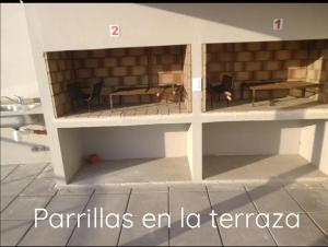 a model of a table and chairs in a room at COSTA y MAR in Villa Gesell