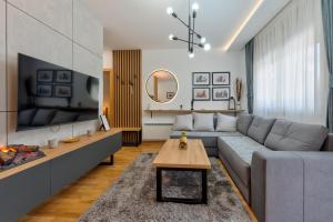 Posezení v ubytování Lazy Bear Moderan Spa na Planini