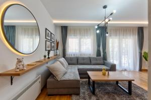 Posezení v ubytování Lazy Bear Moderan Spa na Planini