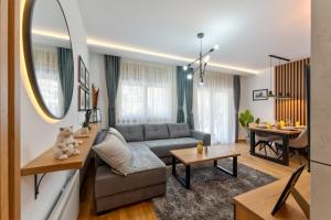 Posezení v ubytování Lazy Bear Moderan Spa na Planini