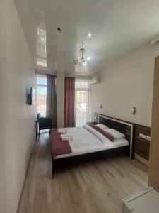 Postel nebo postele na pokoji v ubytování MAHALI HOTEL