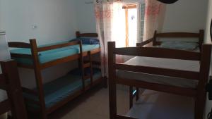 Postel nebo postele na pokoji v ubytování Casa Temporada + 12 fotografií
