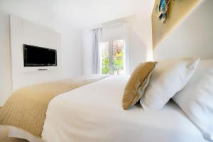 Posteľ alebo postele v izbe v ubytovaní Bull Vital Suites & Spa Boutique Hotel - Only Adults