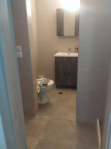 Photo de la galerie de l'établissement ANATOLI BEACH APARTMENTs LIGARIA, à Ligaria