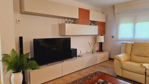 TV a/nebo společenská místnost v ubytování Casa Rural Simonan Borda