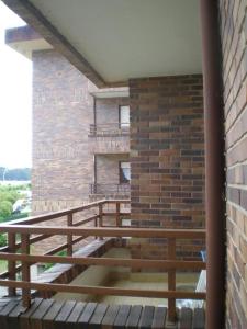 A balcony or terrace at Surf Playa 1 línea