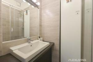 Koupelna v ubytování Flexliving - Room - Lamarck + 3 fotografie