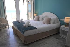 Кровать или кровати в номере Beach View Playa Del Moral