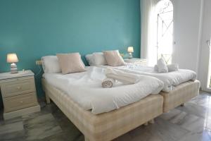Кровать или кровати в номере Beach View Playa Del Moral