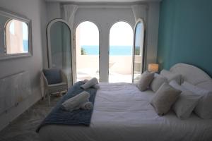 Кровать или кровати в номере Beach View Playa Del Moral
