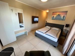 Ένα ή περισσότερα κρεβάτια σε δωμάτιο στο Apartments Ivanisevic