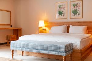 Postel nebo postele na pokoji v ubytování Unsal Hotel