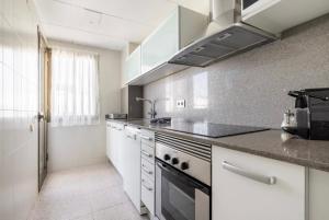 Kuchyňa alebo kuchynka v ubytovaní Beach Apartment in Calafell
