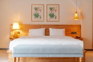 Postel nebo postele na pokoji v ubytování Unsal Hotel