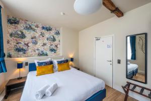 Postel nebo postele na pokoji v ubytování Hotel Onderbergen