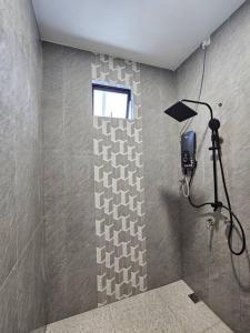 Фотография из галереи ZN Homestay Mengabang Telipot - Private Pool в городе Kampong Pengkalan Maras