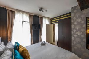 Postel nebo postele na pokoji v ubytování Hotel Onderbergen