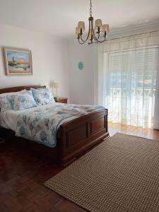 Postel nebo postele na pokoji v ubytování Villa Bela Vista near a surf spot