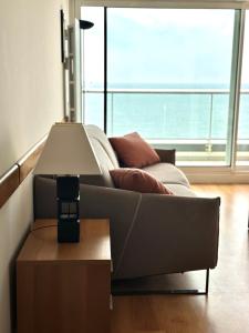 Posedenie v ubytovaní Joli appartement avec vue imprenable sur la baie des Sables - 4 pers