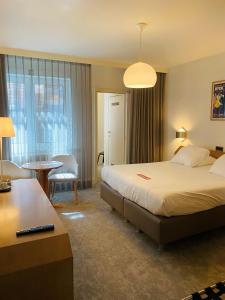 Postel nebo postele na pokoji v ubytování Hotel Prado