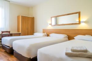 Posteľ alebo postele v izbe v ubytovaní Hotel YIT Ciudad de Elche