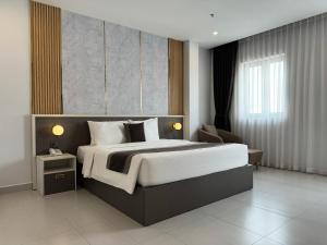 Ένα ή περισσότερα κρεβάτια σε δωμάτιο στο LION 3 HOTEL +50 φωτογραφίες