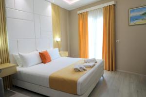Postel nebo postele na pokoji v ubytování Hotel Strora