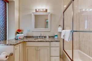 a bathroom with a sink and a shower at Gloucester Harbor Hideaway in Gloucester +18 photos