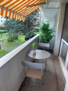 Taman di luar Appartement entier climatisé - parking privé
