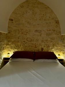 Postel nebo postele na pokoji v ubytování Al Murigini - Casa Vacanze